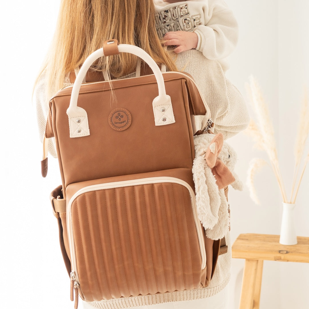 sac à langer lenappy sur le dos